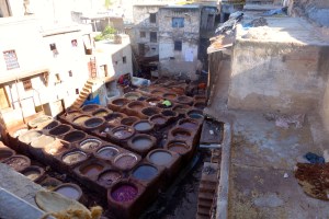 This is the third hardest job IN THE WORLD!! This picture could be in a magazine. I've seen pictures of the tanneries like this before in our travel books.