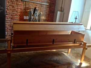 Re-Usable coffin by Joseph I, you put the body in the top half, dig the hole and partially lower the coffin into the hole, then turn the lever on the end and the body drops out of the bottom of the coffin. He had some strange ideas back then, this was only used for about a century.