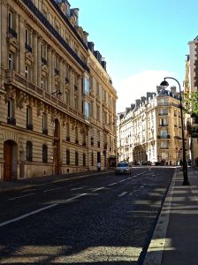 Normal street in Paris without trees. Most of them have some trees though.