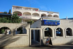 Our villa, we stayed in the room just under where the towel is hanging from the top floor balcony!