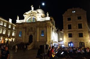 Our live entertainment in the middle square of Old Town. Notice the beautiful stained glass windows that light up in St. Blaise church in the background.? (St. Blaise is the patron saint of Dubrovnik) 