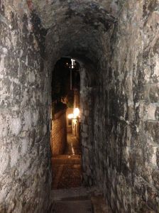 Another walkway that opens into a square.