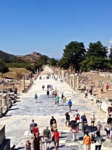 Close up of Harbor Street - all streets were lined with statues and under them ran sewage canals and, above, water from fountains cascaded down the slopes continually keeping them clean. To help drainage and prevent feet or chariot wheels from slipping, the city scored and etched the marble in a way not unlike that seen on concrete roads today to prevent aquaplaning. Holes in the marble show where portable street lights were placed when it became dark, b/c Ephesus was the only city at the time to allow lights after dark, as it thrived with business at night time. 