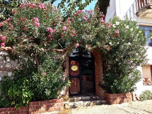 OMG!! Thank goodness we stopped short of the house. Here is our entrance to our hotel. Very nice place!
