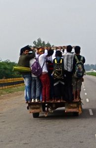 This taxi has at least 35 people on it!