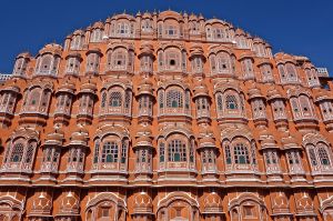 The women used to sit behind these windows and watch the action in the streets.
