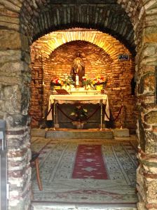 The shrine built where the fireplace was in honor of Mary.
