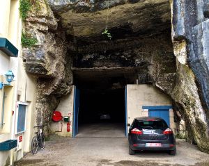 To the left of our car is a limestone cave that our hotel was using as a parking garage! We didn't go into the cave. We were afraid there may be troglodytes in it!