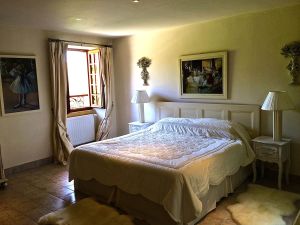 Photo of master bedroom. No screens or air conditioning. You have to make choices. It does have a heated pool. 