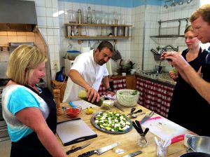 Here we are with Ian putting on the finshing touches to our green salad we all made in class! Thank goodness Ian didn't ban our iPhones! 