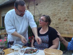 Angela getting instructions on how to cut her beef the french way!