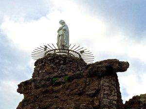 Statute of the Virgin Mary at the entrance to the harbor at Biarritz.