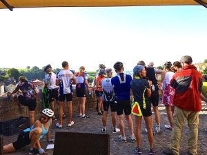 Bicyclists at their morning briefing in St. Emilion before taking off on their 49.709 mile ride. My partners Craig Helmreich and David Robinson should check this out for future vacation plans. 