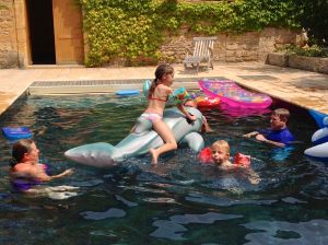 Looks like the kids had a great time in the pool! They could have stayed in it all day!