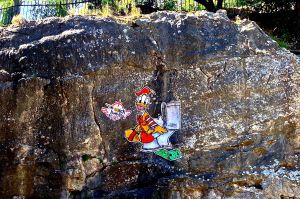 And, when we came out of the church, and turned left, this is what was on the rock wall! It made NO SENSE to us... Does it to any of you???