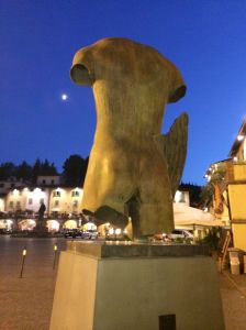 This sculpture anchors one point on the Greve triangular main square. We caught him "mooning" on this evening stroll with our gelato.