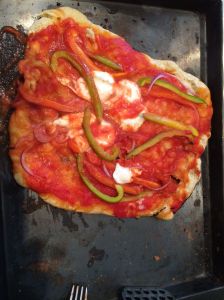 Voila!!  Our very first wood grilled pizza!  How did we do?  