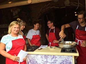 This is Rita, our group and our instructor in the white t-shirt at our Certaldo Italian cooking class.  Class included English, Danes, and Australians.  