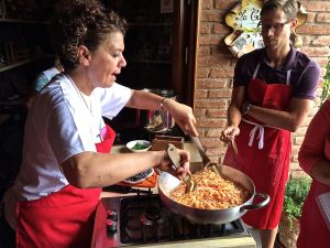 Our instructor putting the finishing touches on tagliatelle with pomodoro sauce.  None of that American marinara sauce allowed.  